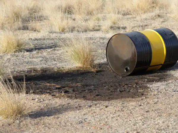Leaking oil barrel wasting nature